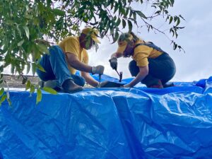 Alabama Baptist Disaster Relief volunteers from Southeast Alabama Baptist Association work on a damaged roof in Clearwater, South Carolina